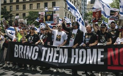 Family members of hostages march during the annual Israel Day Parade. Photo: AP Photo/Yuki Iwamura