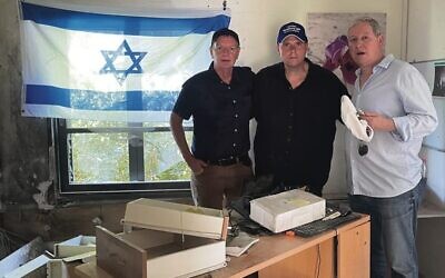 From left: David Southwick, James Newbury and David Davis at Kibbutz Be'eri.