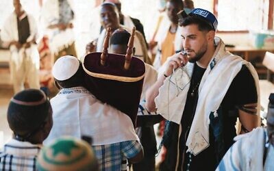 Rudy Rochman with the Abayudaya Jewish community in Uganda.    Photo: Instagram @wewereneverlost