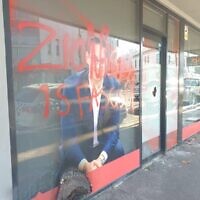 Antisemitic graffiti on the vandalised office of Jewish MP Josh Burns in the Melbourne suburb of St Kilda last week. Photo: Peter Haskin
