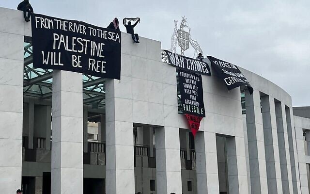 Protesters on the roof of Parliament House on Thursday. Photo: Facebook