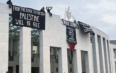 Protesters drape anti-Israel banners over Parliament House in Canberra in early July. Photo: Facebook