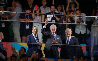 US President Joe Biden, Prime Minister Yair Lapid and President Isaac Herzog visit the opening ceremony of the Maccabiah Games in Jerusalem on July 14, 2022. (The Times of Israel: Olivier Fitoussi/Flash90)