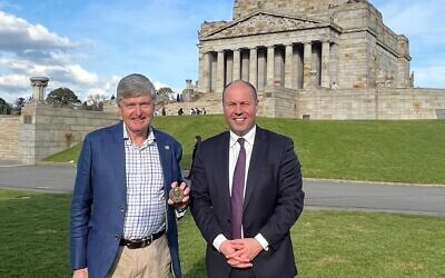 Josh Frydenberg (right) being presented with the medal outside the Shrine of Remembrance. Josh Frydenberg (right) being presented with the medal outside the Shrine of Remembrance.
