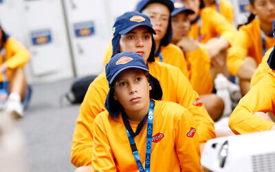 Listening intently to the morning briefing.