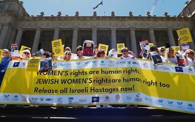 Women on the steps of Victoria’s Parliament House show their solidarity and proclaim that Jewish women’s rights are human rights too. Photo: Peter Haskin