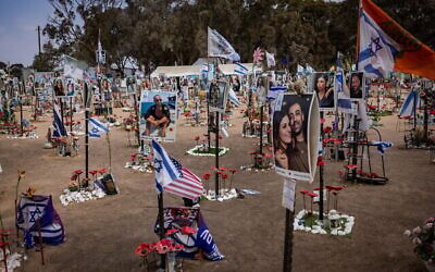 Israelis visit the site of the October 7, 2023, Supernova music festival massacre, on October 6, 2024. (The Times of Israel: Yonatan Sindel/Flash90)