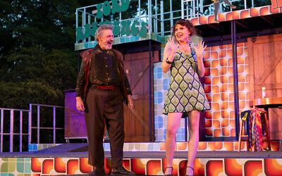 Peter Houghton stars as Sir John Falstaff and Elizabeth Brennan plays Mistress Ford in The Merry Wives of Windsor. Photo: Ben Fon