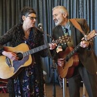 Deborah Conway and Willy Zygier performing.