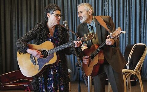 Deborah Conway and Willy Zygier performing.