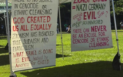 Offensive banners hung from Greens MP Elizabeth Watson-Brown's banners in Brisbane. Photo: Facebook Offensive banners hung from Greens MP Elizabeth Watson-Brown's banners in Brisbane. Photo: Facebook