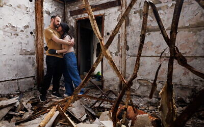 Four months after October 7, Ellay and Ariel return to their home which was burned down by Hamas terrorists. Photo: Ziv Koren/Polaris