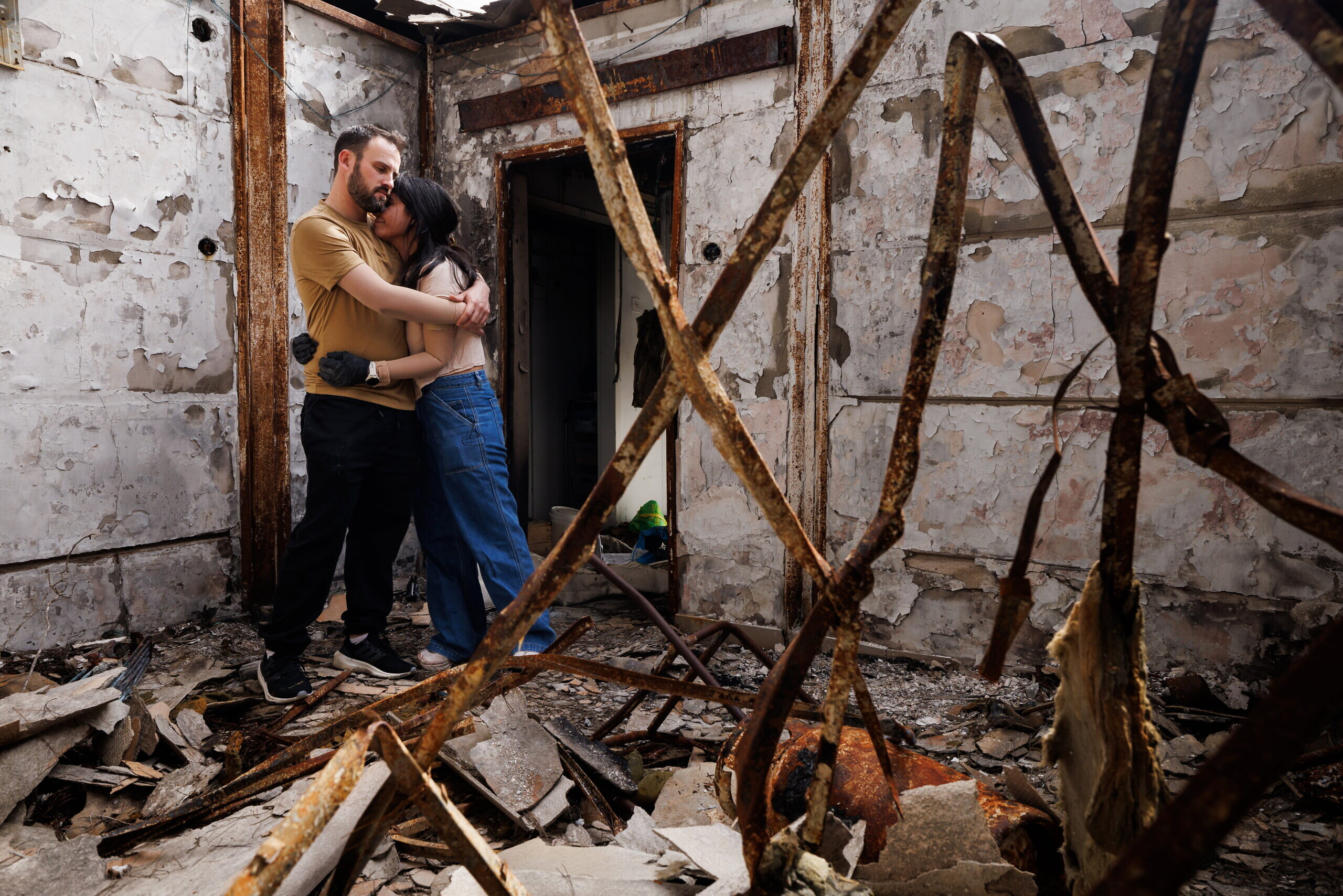 Four months after October 7, Ellay and Ariel return to their home which was burned down by Hamas terrorists. Photo: Ziv Koren/Polaris Four months after October 7, Ellay and Ariel return to their home which was burned down by Hamas terrorists. Photo: Ziv Koren/Polaris