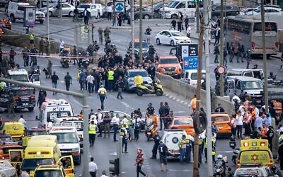 Police and rescue personnel at the scene of a terror attack at Ramot Junction near the entrance to Jerusalem, September 8, 2025 (Chaim Goldberg/FLASH90)