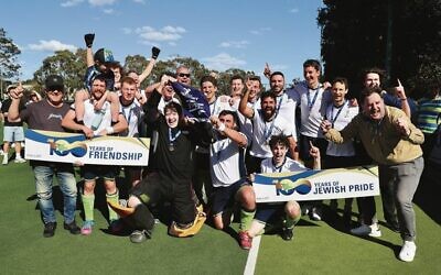 Maccabi men's Metro 2 East team celebrates their 2025 premiership win. Photos: Peter Haskin
