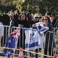 Spectators with Australian and Israeli flags.