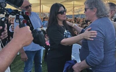 Peter Lavac meeting a Druze mother whose young daughter Alma, and 11 other children, were killed by a Hezbollah rocket while playing soccer in Madjal Shams.