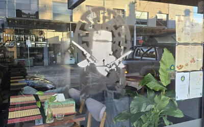 The graffiti stencil used Ned Kelly in front of a Nazi Black Sun symbol. Photo Facebook.