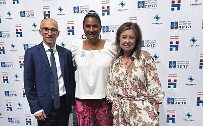 From left: Adam Ognall, Nova Peris, Nicole Brittain. Peris was a guest at the opening.