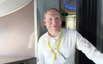 NBN co-founder and executive director Rabbi Yehoshua Fass on the Nefesh B’Nefesh charter flight, August 20, 2025 Photo: Zev Stub/Times of Israel)