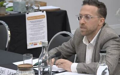 Joel Lazar, representing the Jewish Climate Network at the Senate committee.