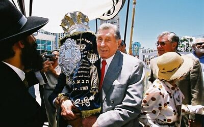 Eddie Kornhauser (pictured at a Torah dedication in the early 2000s), the visionary developer behind the Paradise Centre and Chevron Renaissance, left an indelible mark on Queensland's tourism and property industries.