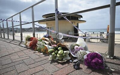 Flowers at Bondi Beach on Monday, December 15. Photo: AAP Image/Dean Lewins