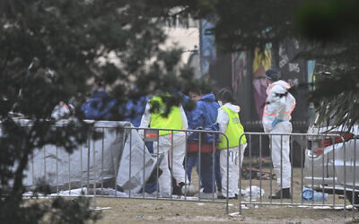 Forensic officers at the scene of Sunday's shooting at Bondi Beach on Monday, December 15. Photo: AAP Image/Dean Lewins