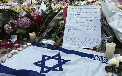 A message of hope left at the memorial at Bondi Beach.