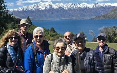 Walkers enjoy New Zealand’s spectacular scenery in Queenstown.