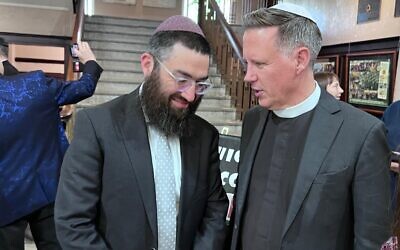 Rabbi Nathanson with Dr French at Tuesday night's Chanukah event. Photo: Bruce Hill.