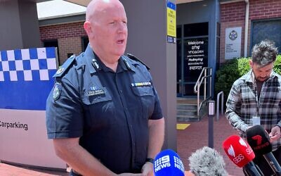 Victoria Police Assistant Commissioner Chris Gilbert briefing the media outside the Caulfield Police station about their investigation into the car firebombing.