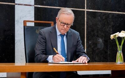 Prime Minister Anthony Albanese signs the condolence book for Bondi victims at Parliament House on December 20, 2025. Photo: Facebook