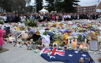 People gather to pay their respects at Bondi Pavilion on  December 16, 2025. Photo: Nadine Saacks