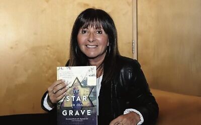 Linda Margolin Royal with her book.