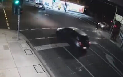 White ute driving towards a Jewish children in Ripponlea on 19 January 2026. Photo: Screenshot Facebook