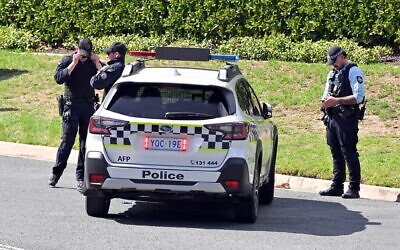 Illustrative: Police officers in Canberra, Australia, on February 18, 2026. (AAP Image/Mick Tsikas/Reuters)