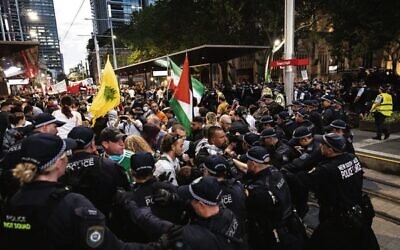 Police and anti-Israel protesters clash.