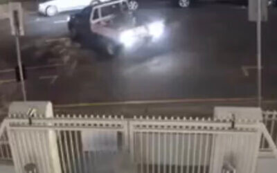 CCTV footage released by Queensland Police of the ute reversing into the synagogue.