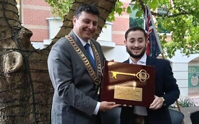 Waverley Mayor Will Nemesh (left) presenting Rabbi Leibel Lazaroff with an honorary Key to the City on February 3. Photo: Shane Desiatnik