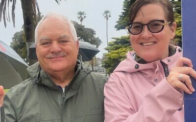 Photo on Natalie Baker and David Taylor at the antisemitism rally.