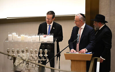 President Isaac Herzog, Prime Minister Anthony Albanese and Rabbi Yehoram Ulman at Chabad of Bondi. Photo: TOI via AP