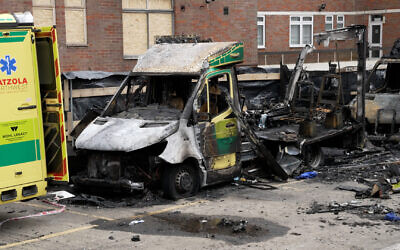The burnt out remains of Hatzola ambulances in Golders Green, London, after an apparent arson attack on four ambulances on Monday. Photo: Jamie Lashmar/PA Wire