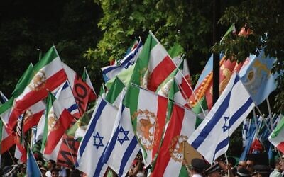 Iranian demonstrators holding pre-revolution Iranian flags and Israeli flags outside the Embassy of Iran in London in June, 2025. Photo: Vuk Valcic/Alamy Live News/Jewish News UK
