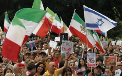 Photo: Iranian Australians and their supporters rally at Hyde Park.