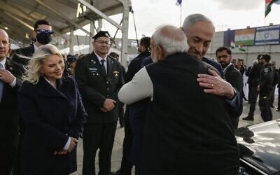 Israeli Prime Minister Benjamin Netanyahu says farewell to his Indian counterpart Narendra Modi at Ben Gurion Airport as wife Sara looks on. Photo: Roi Avraham/GPO