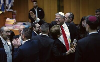 National Security Minister Itamar Ben Gvir celebrates the passing of the death penalty law for terrorists in the Knesset. Photo: Chaim Goldberg/Flash90