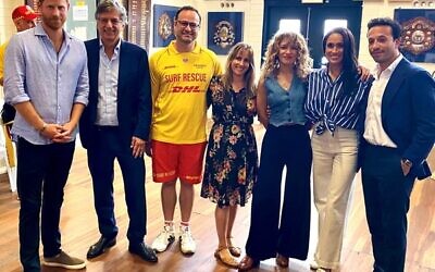 From left: Prince Harry, Greg Shand, Jacob Ezrakhovich, Shannon Biederman, Jessica Chapnik Kahn, Meghan Markle, Elon Zizer. Photo: Geoff Sirmai