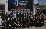 NSW Premier Chris Minns (centre, back row) visiting volunteers at the CHS Emergency Operations Centre.