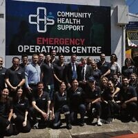 NSW Premier Chris Minns (centre, back row) visiting volunteers at the CHS Emergency Operations Centre.